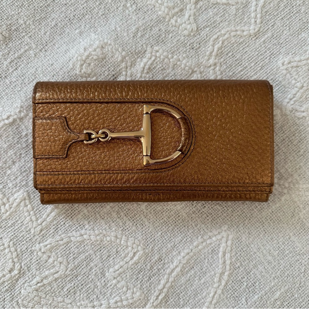 Gucci gold wallet